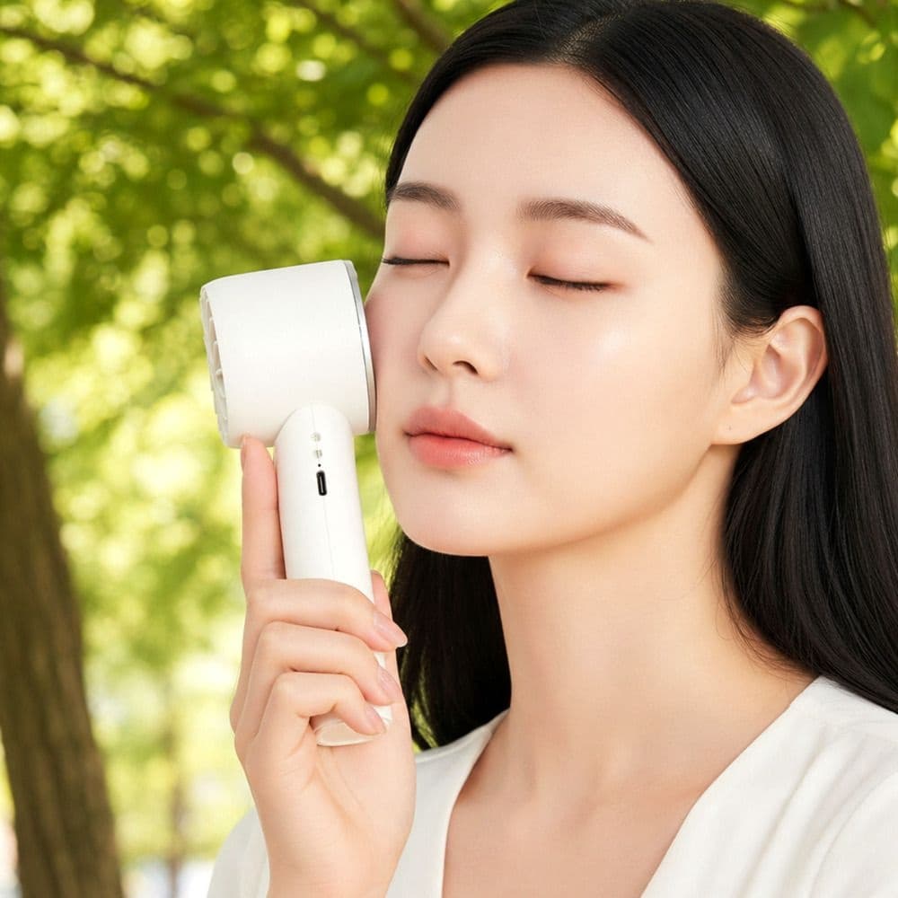 나비 NAVI JA330 휴대용 냉각선풍기 본체와 냉각 패드 결합부가 보이는 제품 이미지